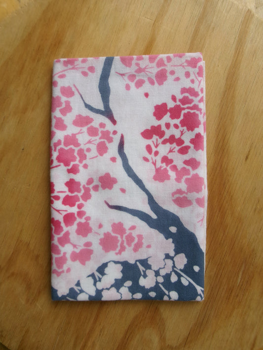 Japanese tenugui towel featuring large cherry blossom (大桜) design by Kamawanu, showcasing detailed floral patterns on fabric.