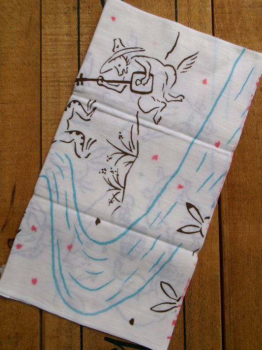 Japanese tenugui towel featuring cherry blossom and picnic scene, traditional fabric from Kamawanu with floral print design.