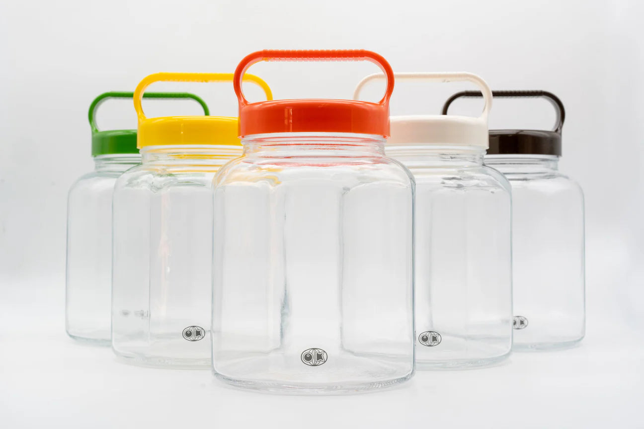 CIBI TOKYO 手さげびん by Okawa Glass, clear glass hand bottle with a handle and narrow neck, ideal for liquids or decorative use
