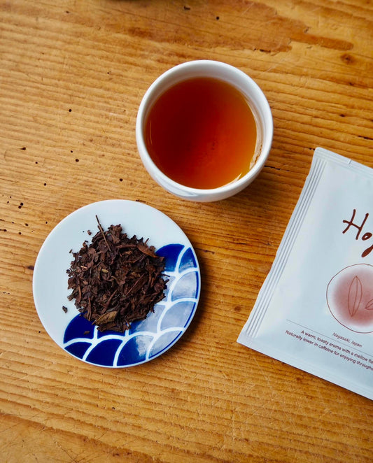 Organic Hojicha drip bag from CIBI TOKYO STORE, showing a tea bag with roasted green tea leaves and packaging design.