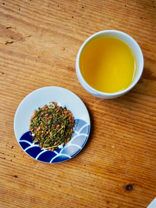 Organic Genmaicha drip bag from CIBI TOKYO STORE, showing a tea bag with green tea leaves and roasted rice inside.