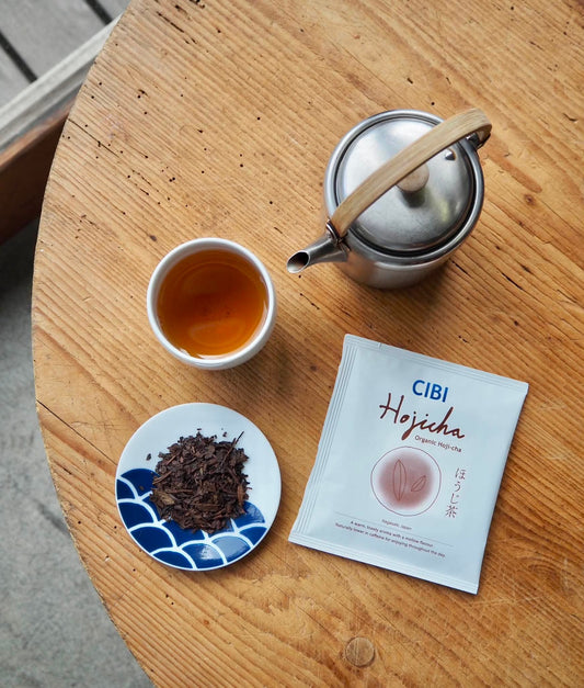 Organic Hojicha drip bag from CIBI TOKYO STORE, featuring a brown paper bag with tea leaves and branding label, ready for brewing.