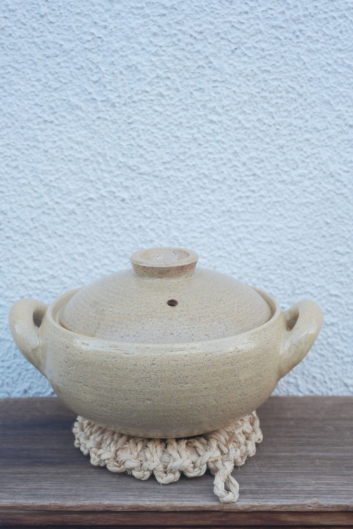 Haseen miso soup donabe small, traditional Japanese clay pot for preparing and serving miso soup with a wooden lid and handles.