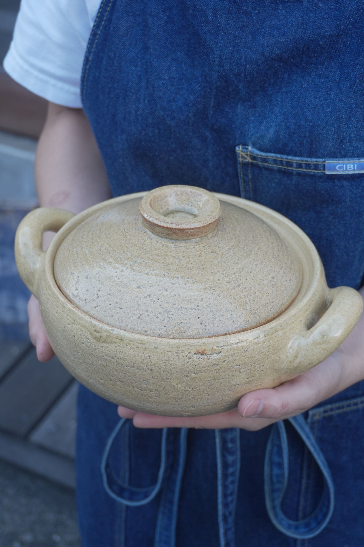 Haseen Nagatanien small miso soup pot with wooden lid, traditional Japanese ceramic cookware on a wooden table.