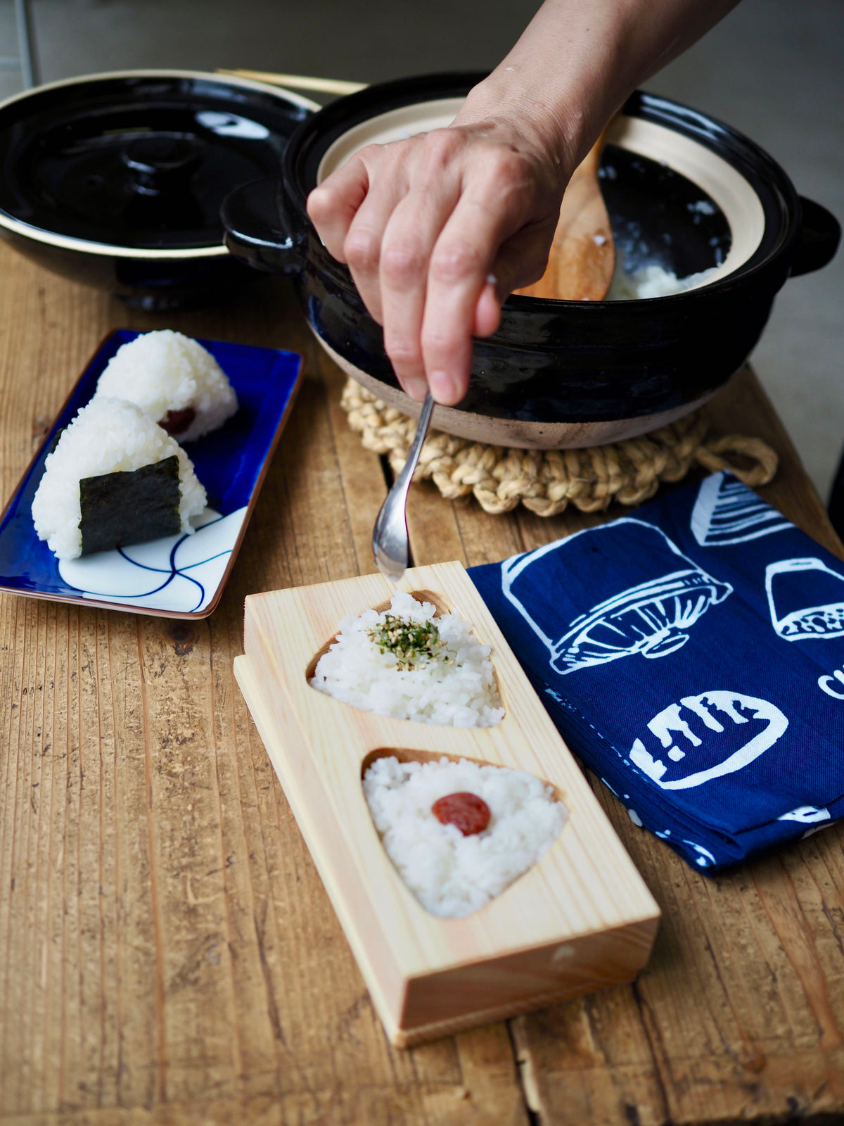 CIBI TOKYO STORE onigiri maker creating rice balls with molded shape for Japanese rice snacks.