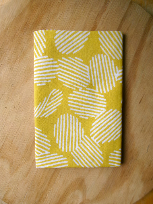 Japanese tenugui towel featuring colorful potato chips pattern by Kamawanu, traditional cloth with vibrant snack design.